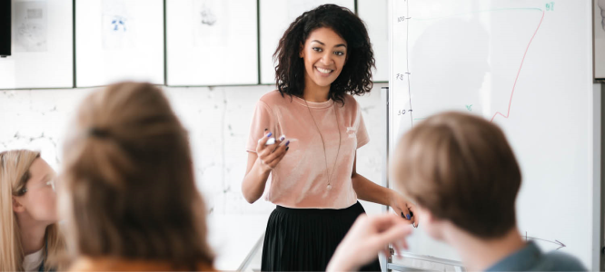 Woman manager speaking to a group of employees